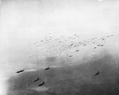 C-47 cargo planes release hundreds of paratroops during Operation Varisty